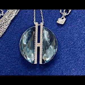 Swarovski Glow Pendant. 30” length